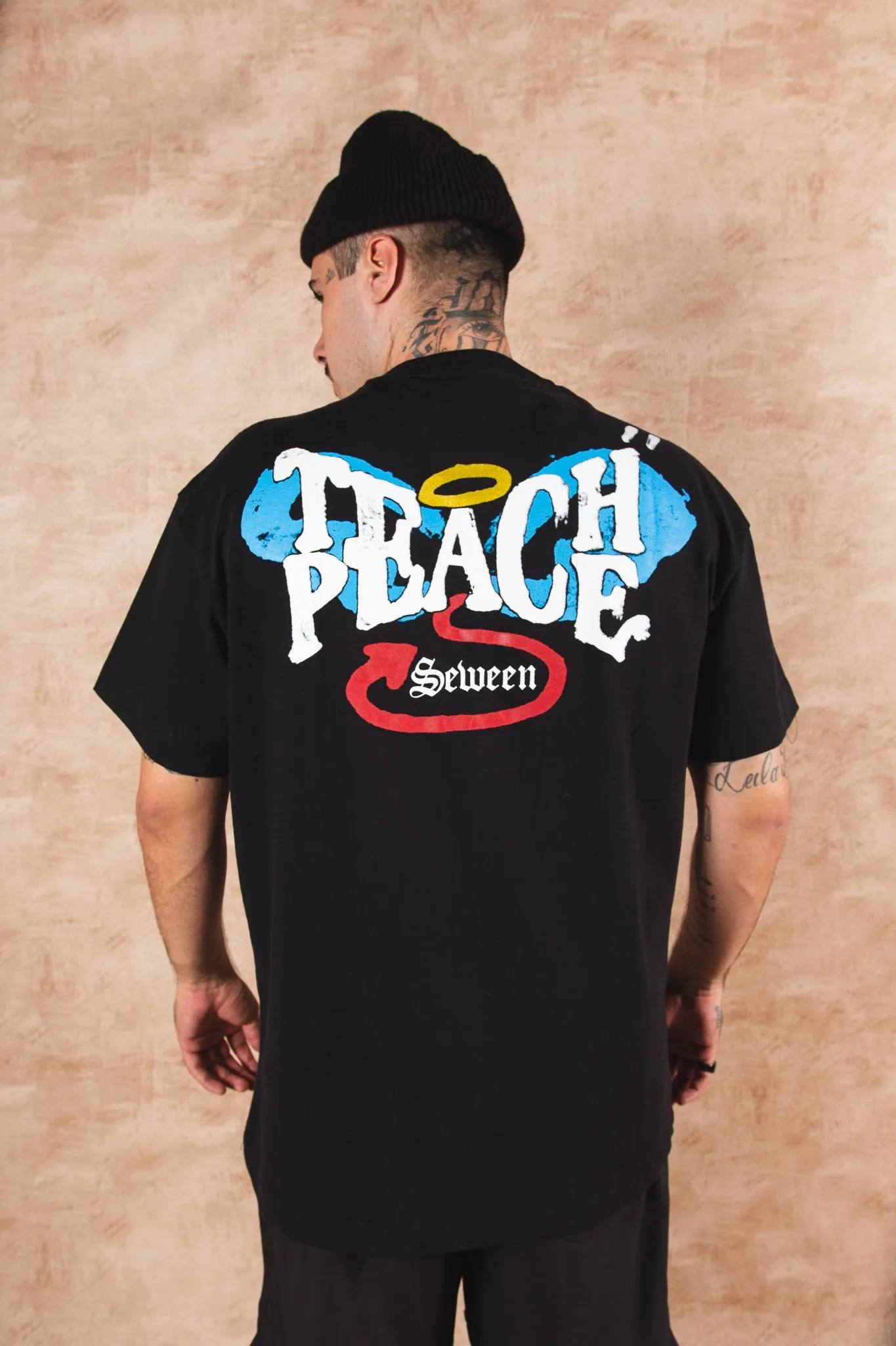 Camiseta Regular Teach Peace